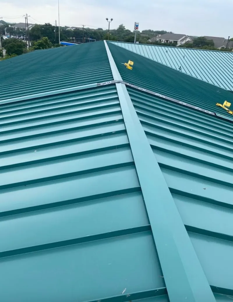 Green commercial metal roof ridge and valley for Metal Roof Repair in Cleburne