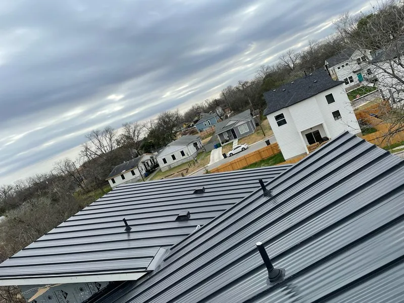 Standing seam metal roof panels with vents for Skylight Repair in Cleburne